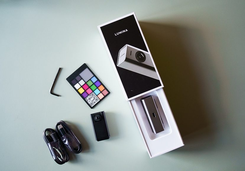 a box with a camera and a remote control.
